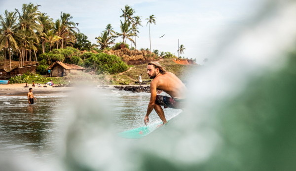 Joshua surfing in Edawa beach.